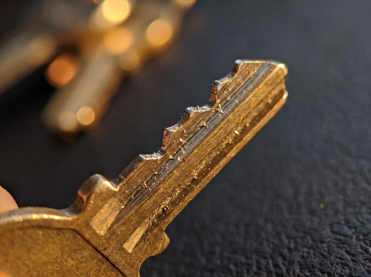 Close view of a freshly cut brass key